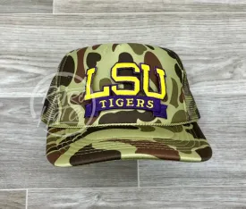 Retro LSU Tigers Banner on Full Camo Meshback Trucker Hat