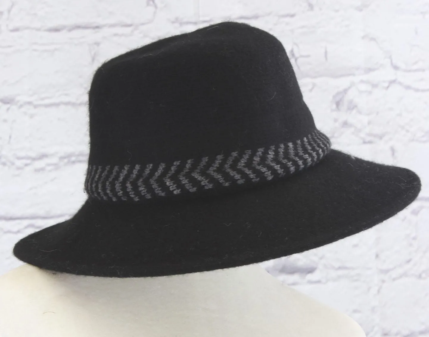 Stylish wool cloche hat with tucked tie rope