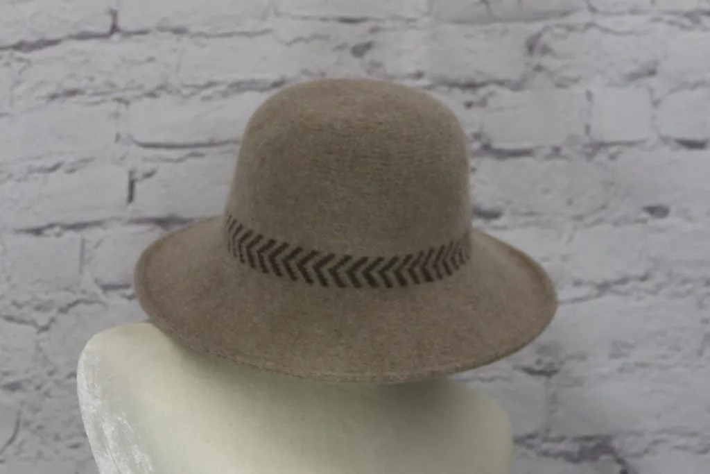 Stylish wool cloche hat with tucked tie rope